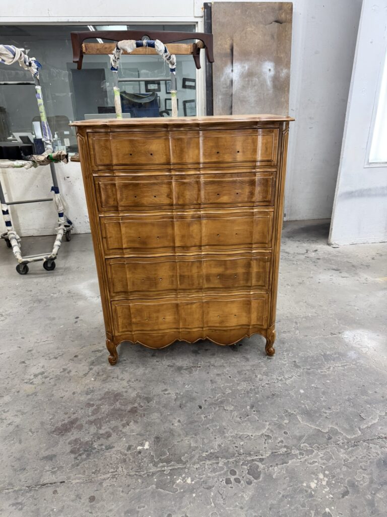 Angelus highboy dresser after restoration - close-up of refinished wood grain
